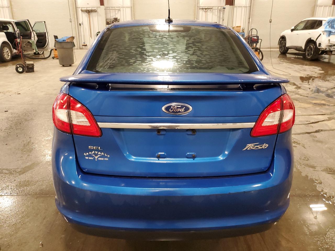 2011 Ford Fiesta Sel VIN: 3FADP4CJ8BM180858 Lot: 80390195