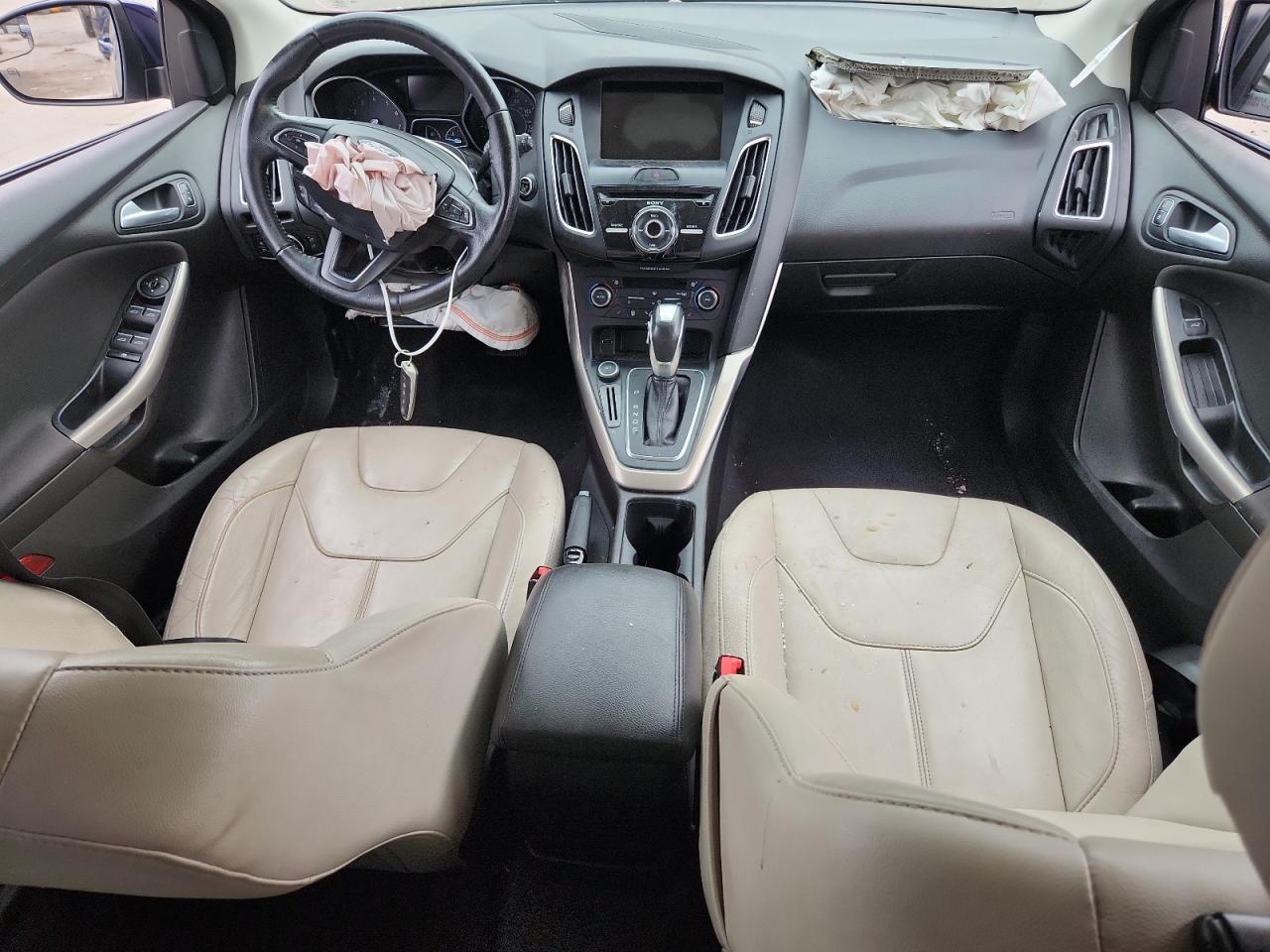 2016 Ford Focus Titanium VIN: 1FADP3N21GL321553 Lot: 81712795