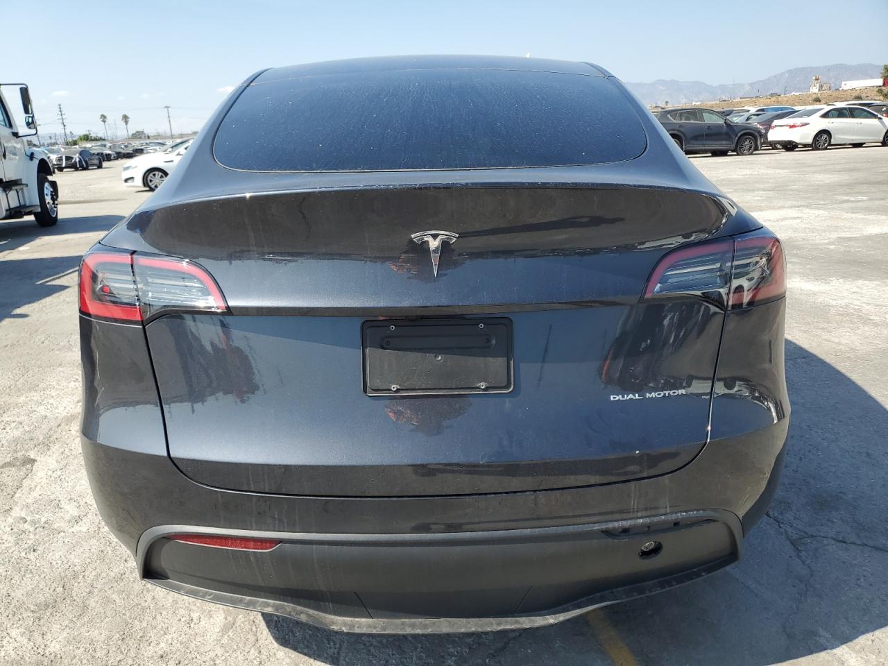 2025 Tesla Model Y VIN: 7SAYGAEE2SF216576 Lot: 84561335