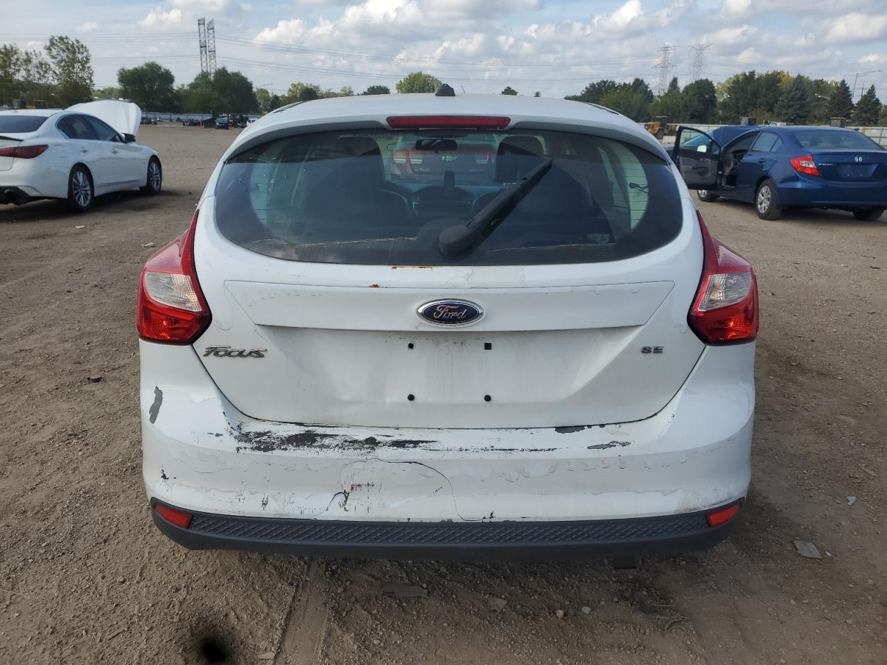 2014 Ford Focus Se VIN: 1FADP3K29EL337789 Lot: 82130205