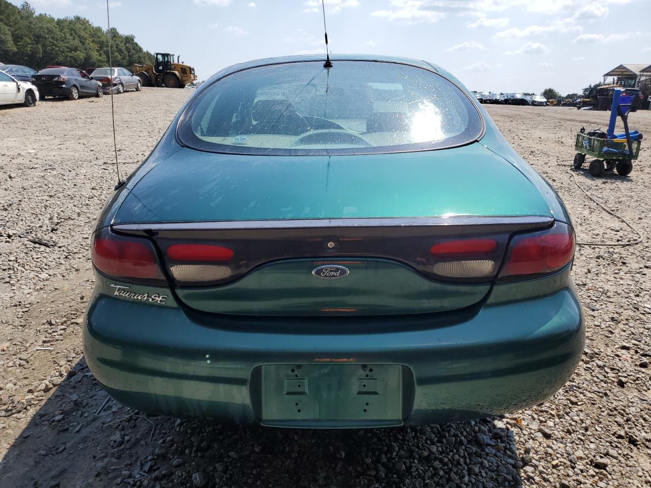1999 Ford Taurus Se VIN: 1FAFP53U0XG112855 Lot: 80790835