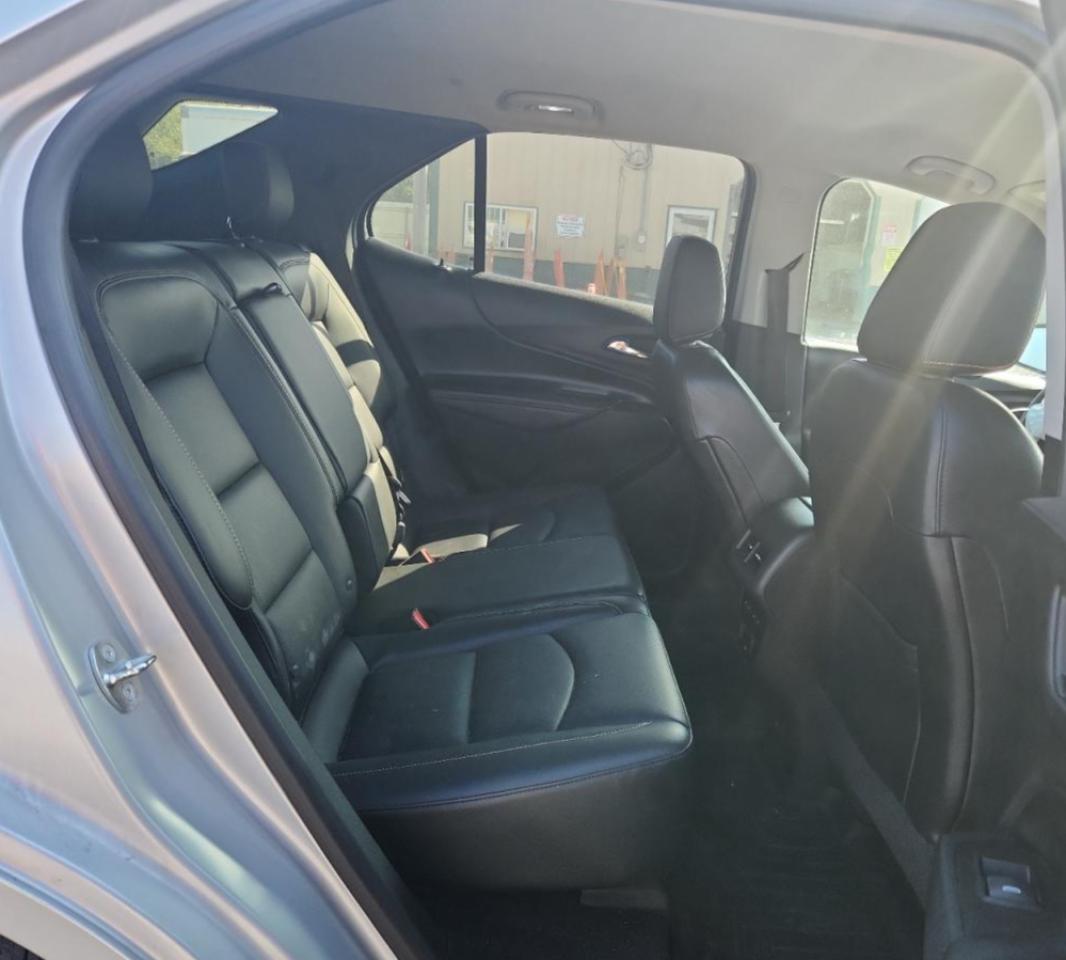 2018 Chevrolet Equinox Premier VIN: 2GNAXMEV5J6138631 Lot: 81776555