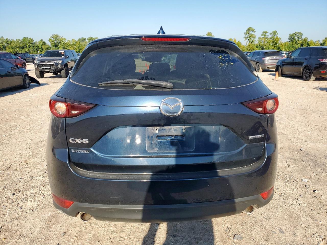 2021 Mazda Cx-5 Touring VIN: JM3KFACM4M0416769 Lot: 70898395