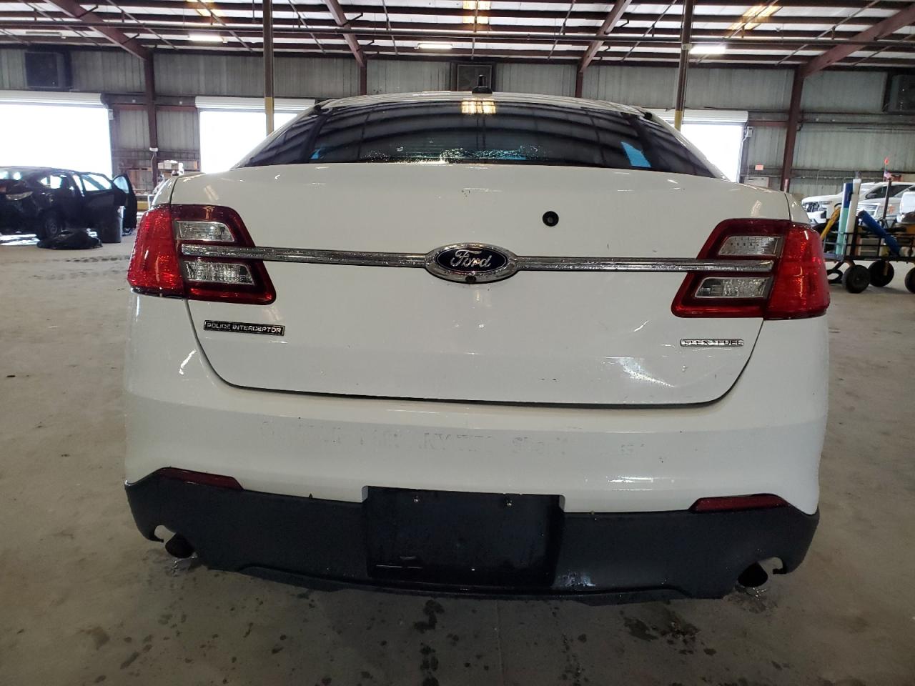 2015 Ford Taurus Police Interceptor VIN: 1FAHP2MKXFG149124 Lot: 84363555