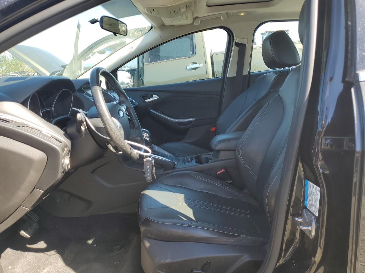 2013 Ford Focus Titanium VIN: 1FADP3J20DL255451 Lot: 82093695