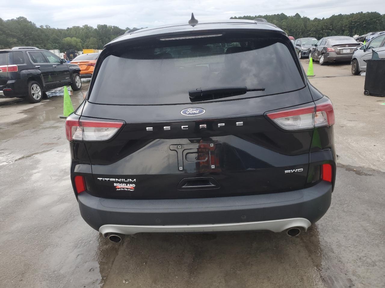 2021 Ford Escape Titanium VIN: 1FMCU9J97MUA71094 Lot: 84000995