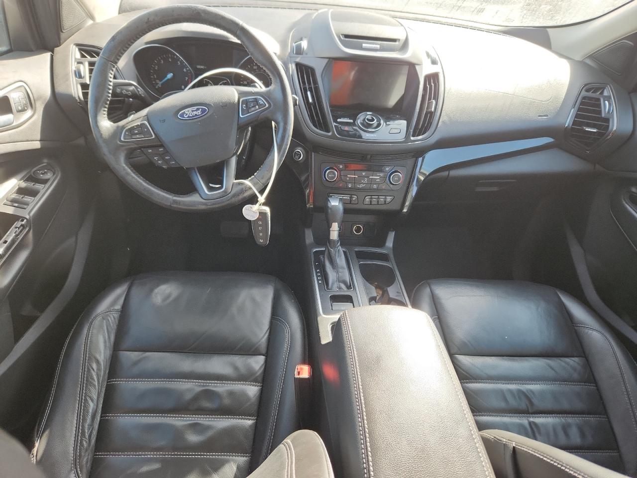 2017 Ford Escape Titanium VIN: 1FMCU0JD4HUE06057 Lot: 80570685