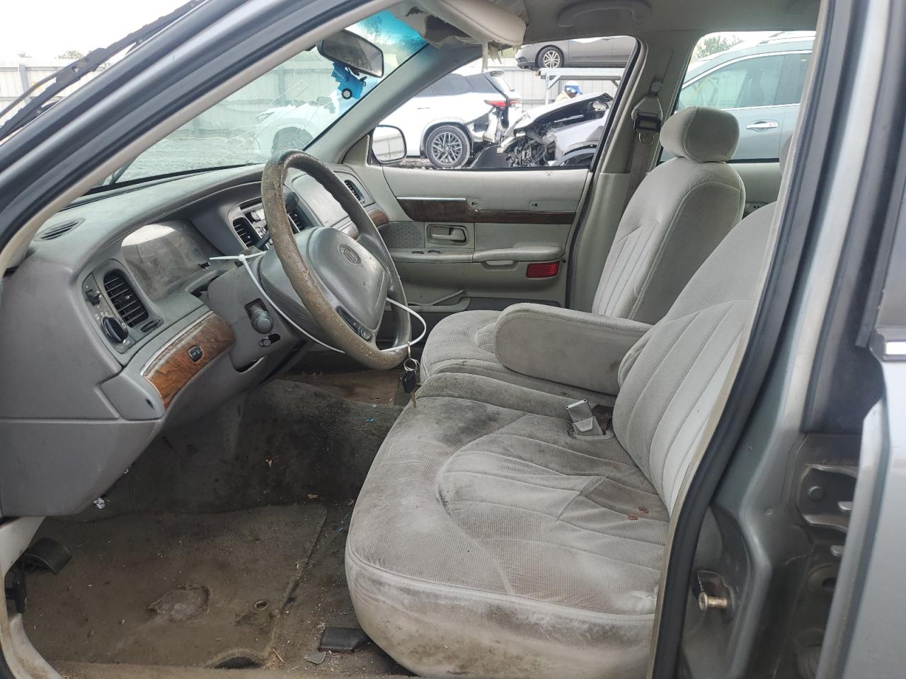 1999 Mercury Grand Marquis Gs VIN: 2MEFM74W2XX660556 Lot: 81733435