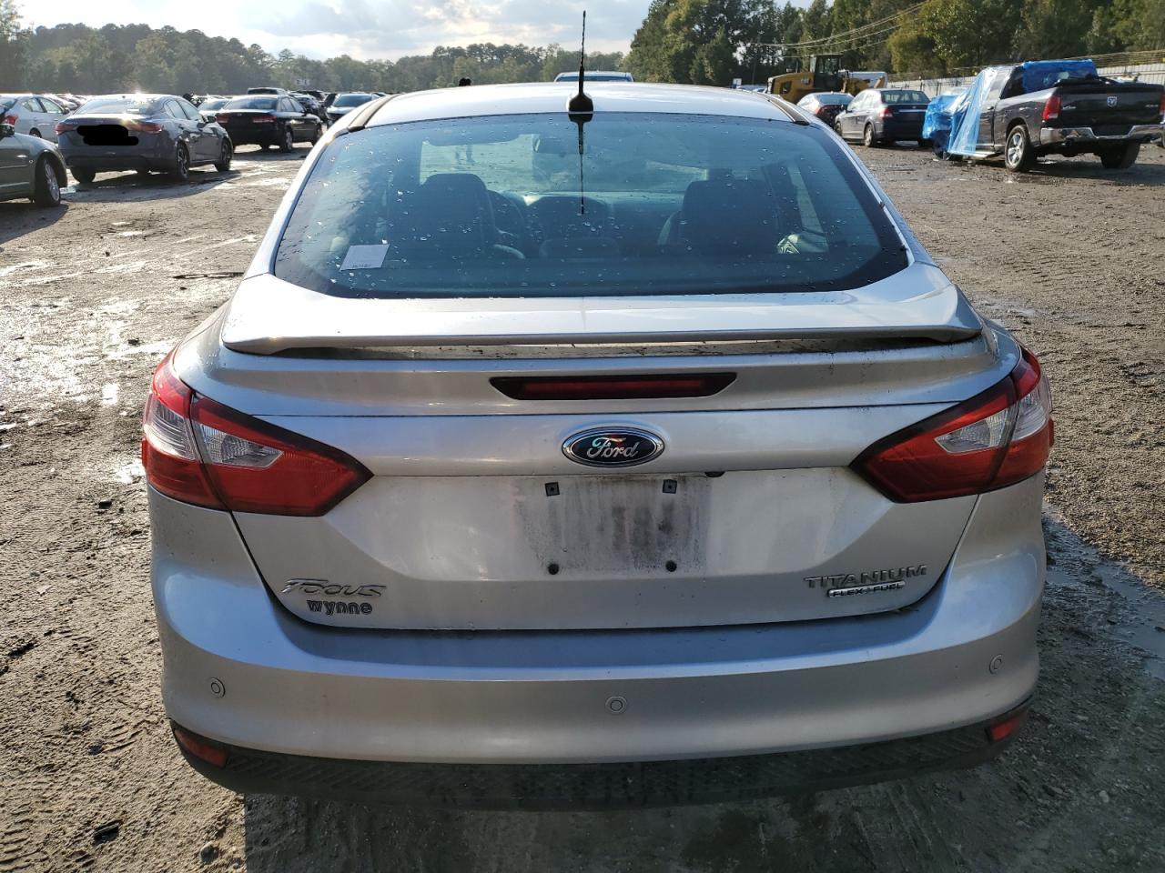 2013 Ford Focus Titanium VIN: 1FADP3J25DL141378 Lot: 81845345