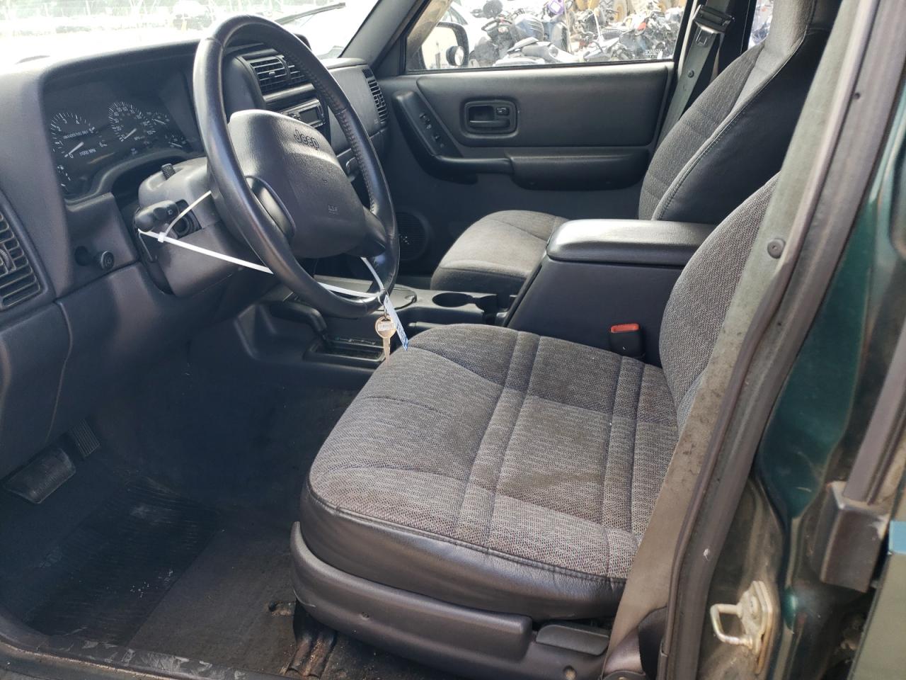 1999 Jeep Cherokee Sport VIN: 1J4FF68S8XL543097 Lot: 82082825