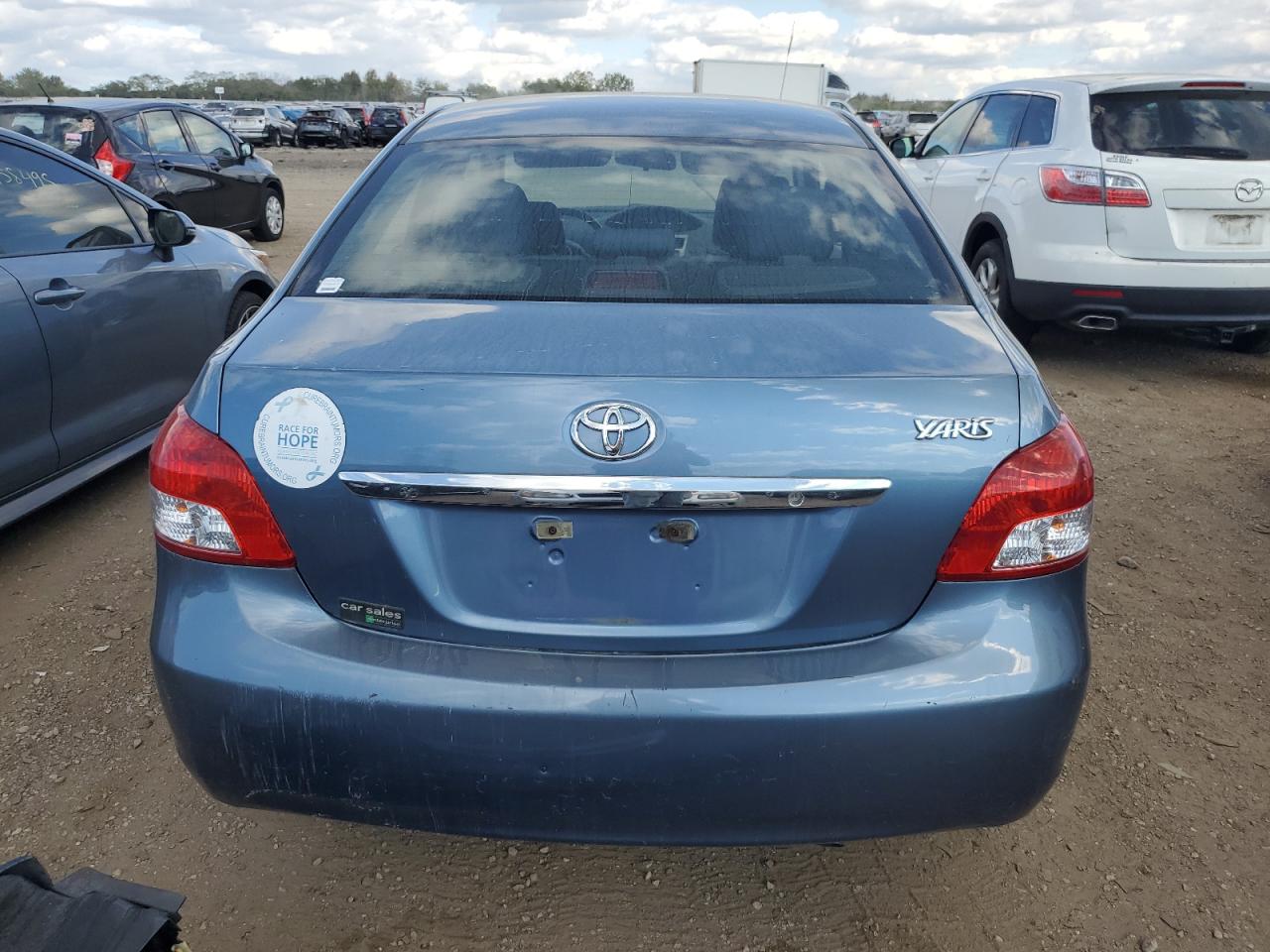 2012 Toyota Yaris VIN: JTDBT4K33CL010670 Lot: 80308145