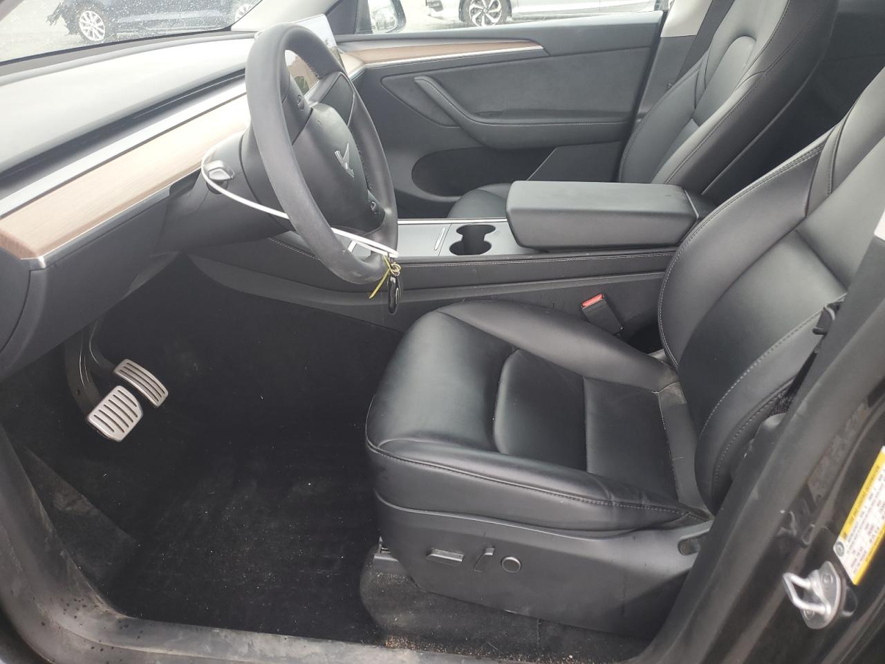 2024 Tesla Model Y VIN: 7SAYGDEF4RF027593 Lot: 81800325