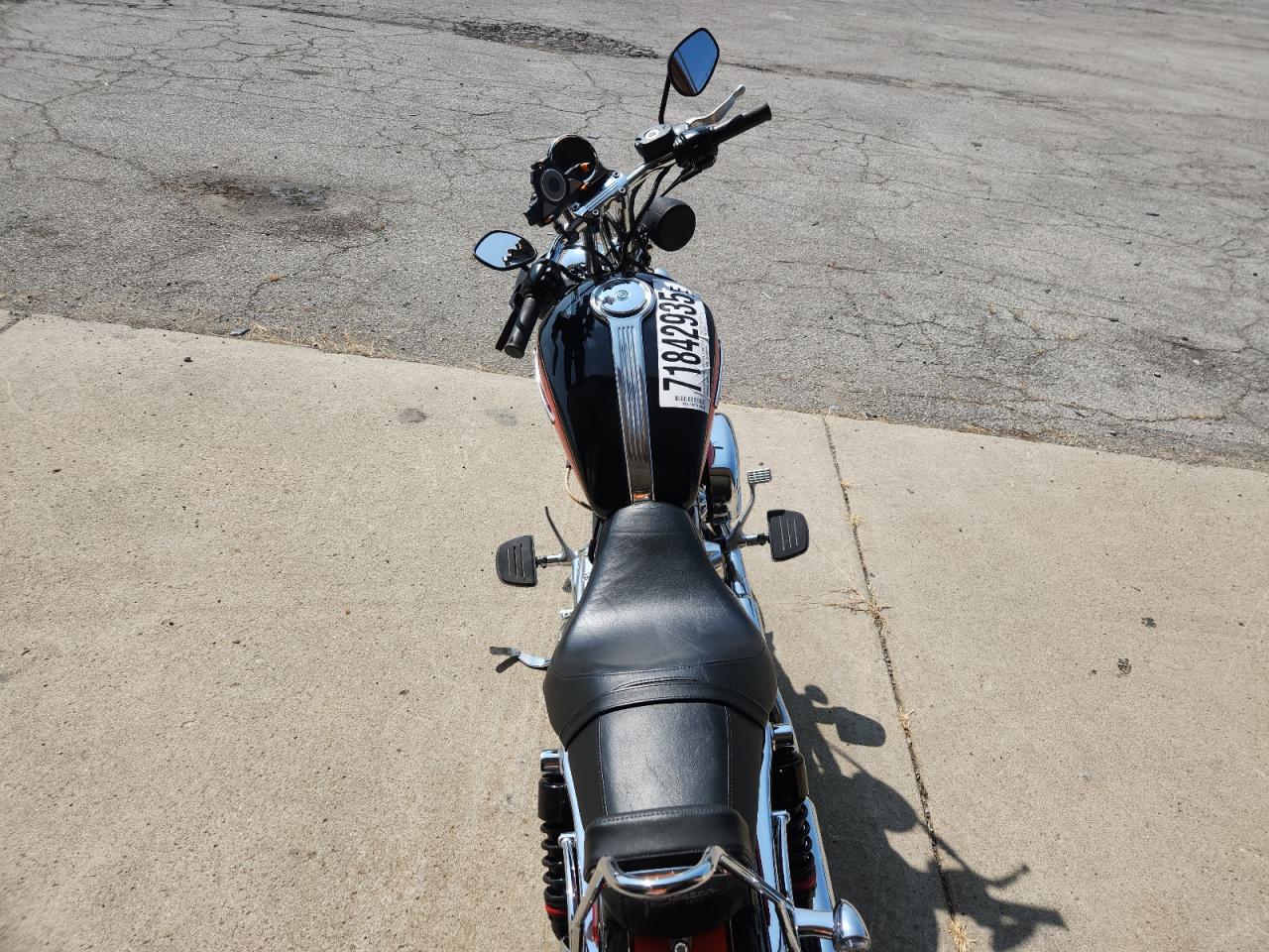 2009 Harley-Davidson Xl1200 C VIN: 1HD1CT3109K424070 Lot: 71842935