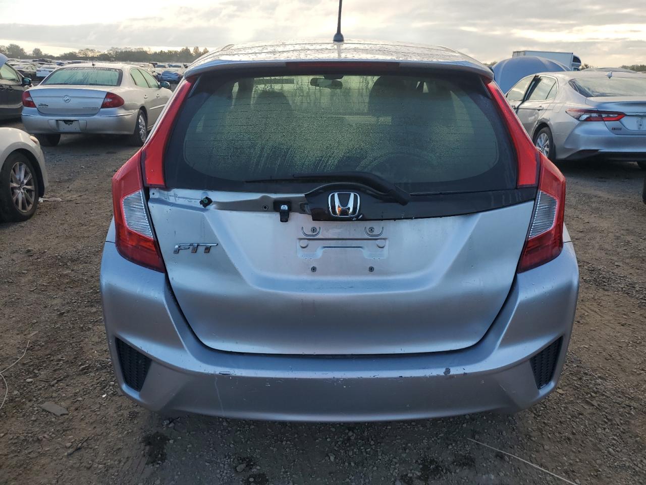 2016 Honda Fit Lx VIN: JHMGK5H54GX021035 Lot: 81524075