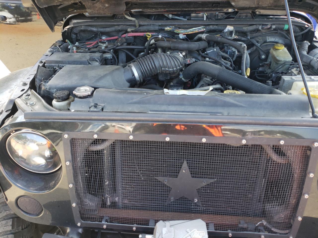 2009 Jeep Wrangler Unlimited Sahara VIN: 1J8GA59119L748734 Lot: 71823575