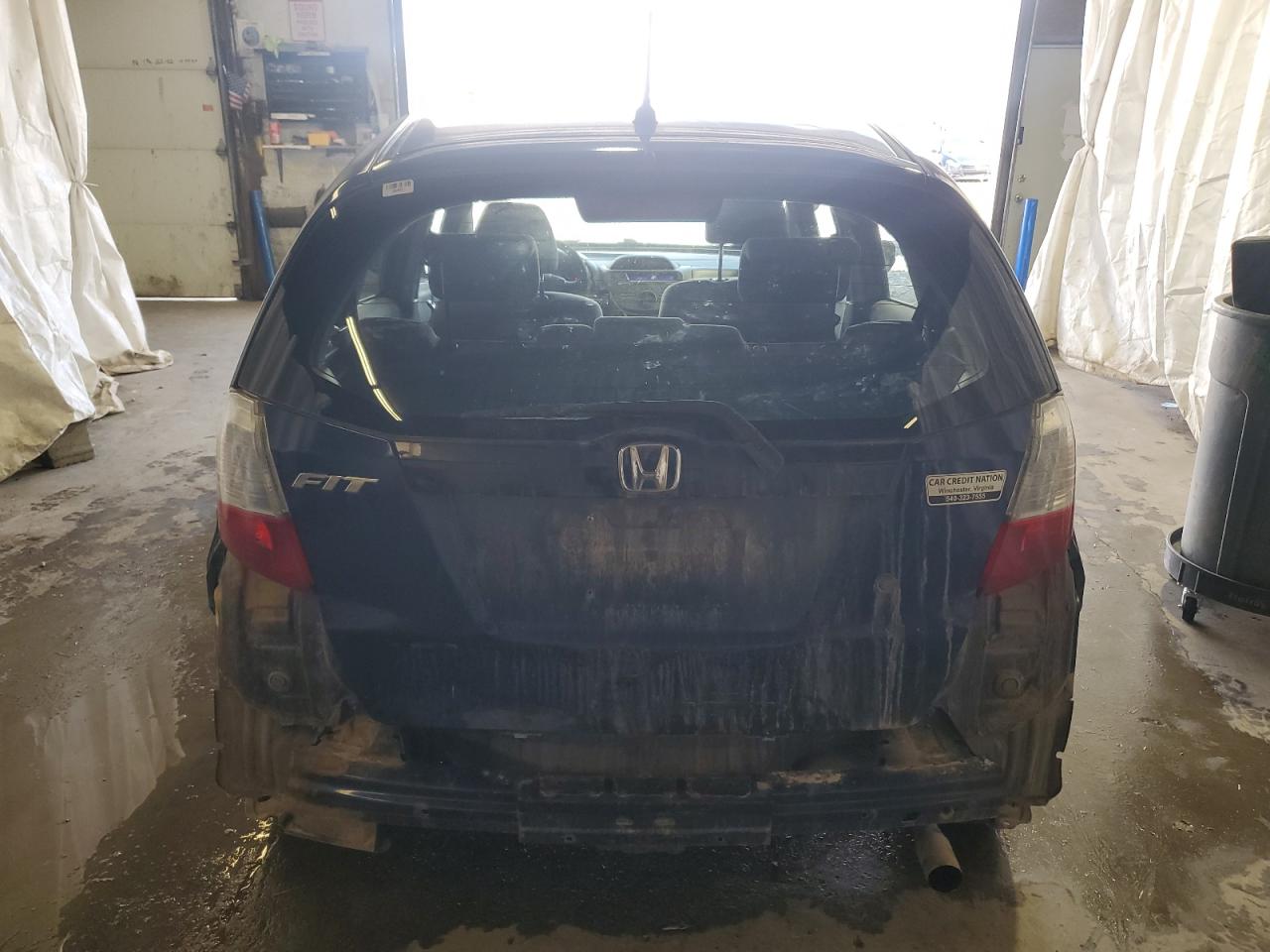 2009 Honda Fit VIN: JHMGE88279S031542 Lot: 82099005