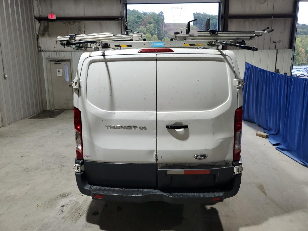 2018 Ford Transit T-150 VIN: 1FTYE1YM0JKA31031 Lot: 83962475
