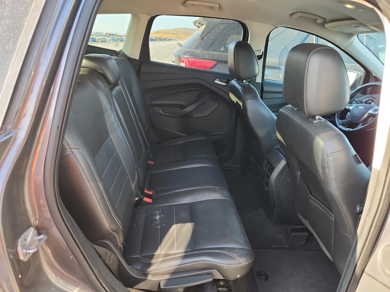 2014 Ford Escape Titanium VIN: 1FMCU0J99EUA63883 Lot: 85892565