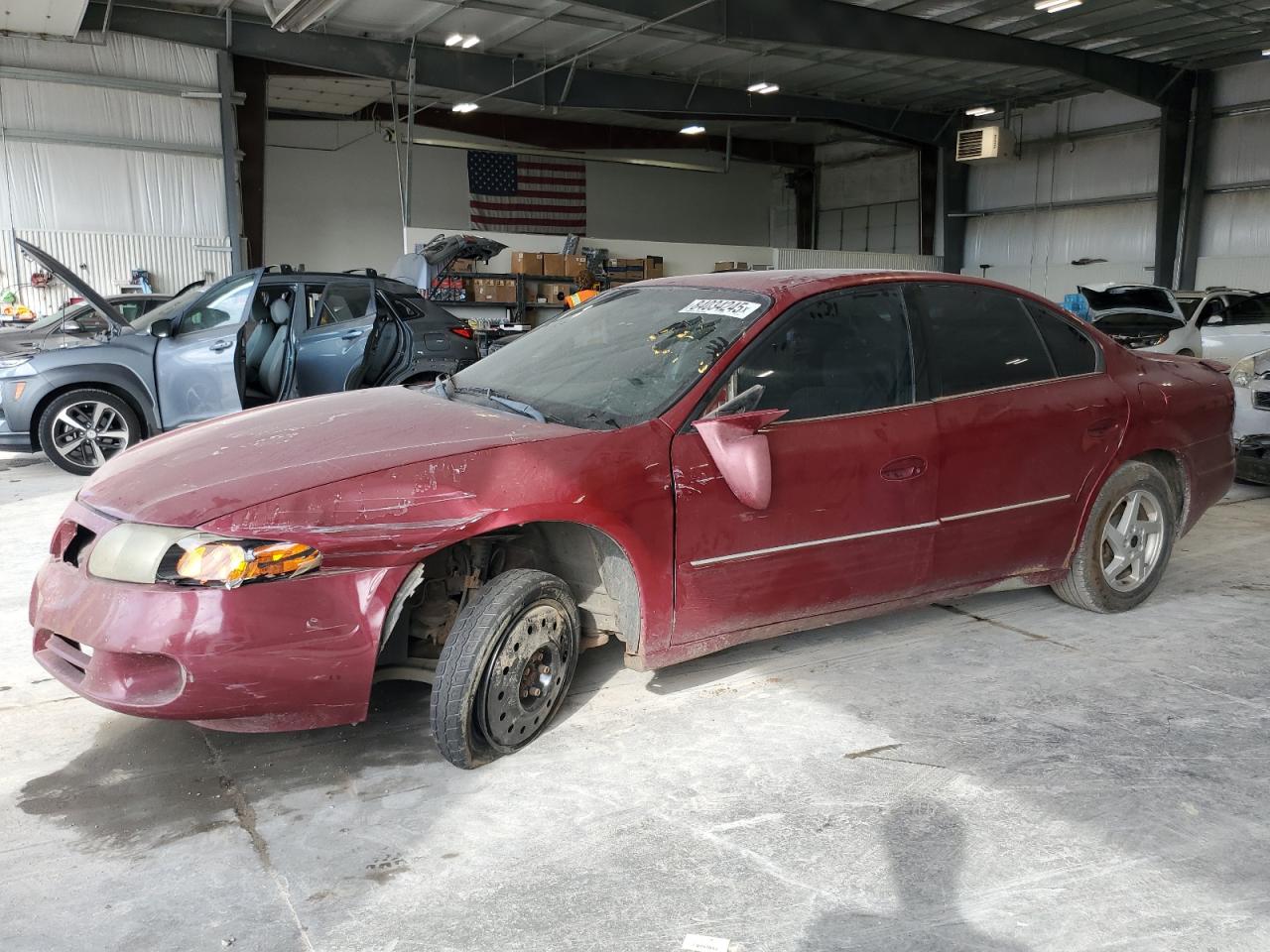 PONTIAC BONNEVILLE 2003. Lot# 84034245. VIN 1G2HX54K234160924. Photo 1