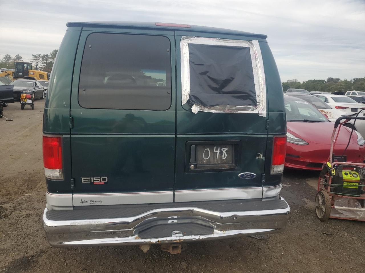 2000 Ford Econoline E150 Wagon VIN: 1FMRE11L3YHB60731 Lot: 84413255