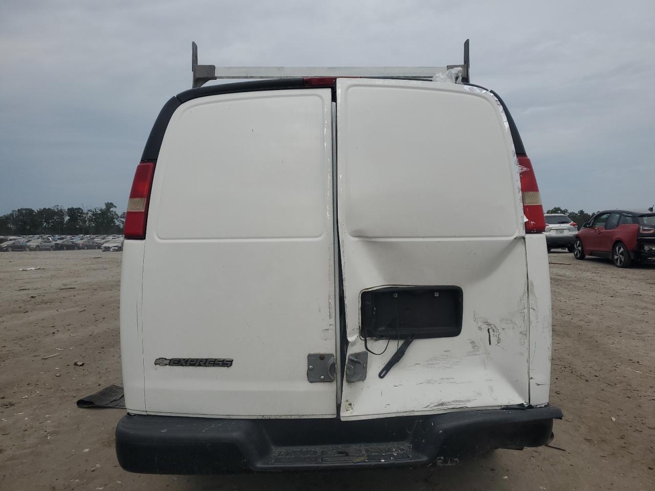 2010 Chev Express G15 VIN: 1GCUGADX2A1179874 Lot: 81594455