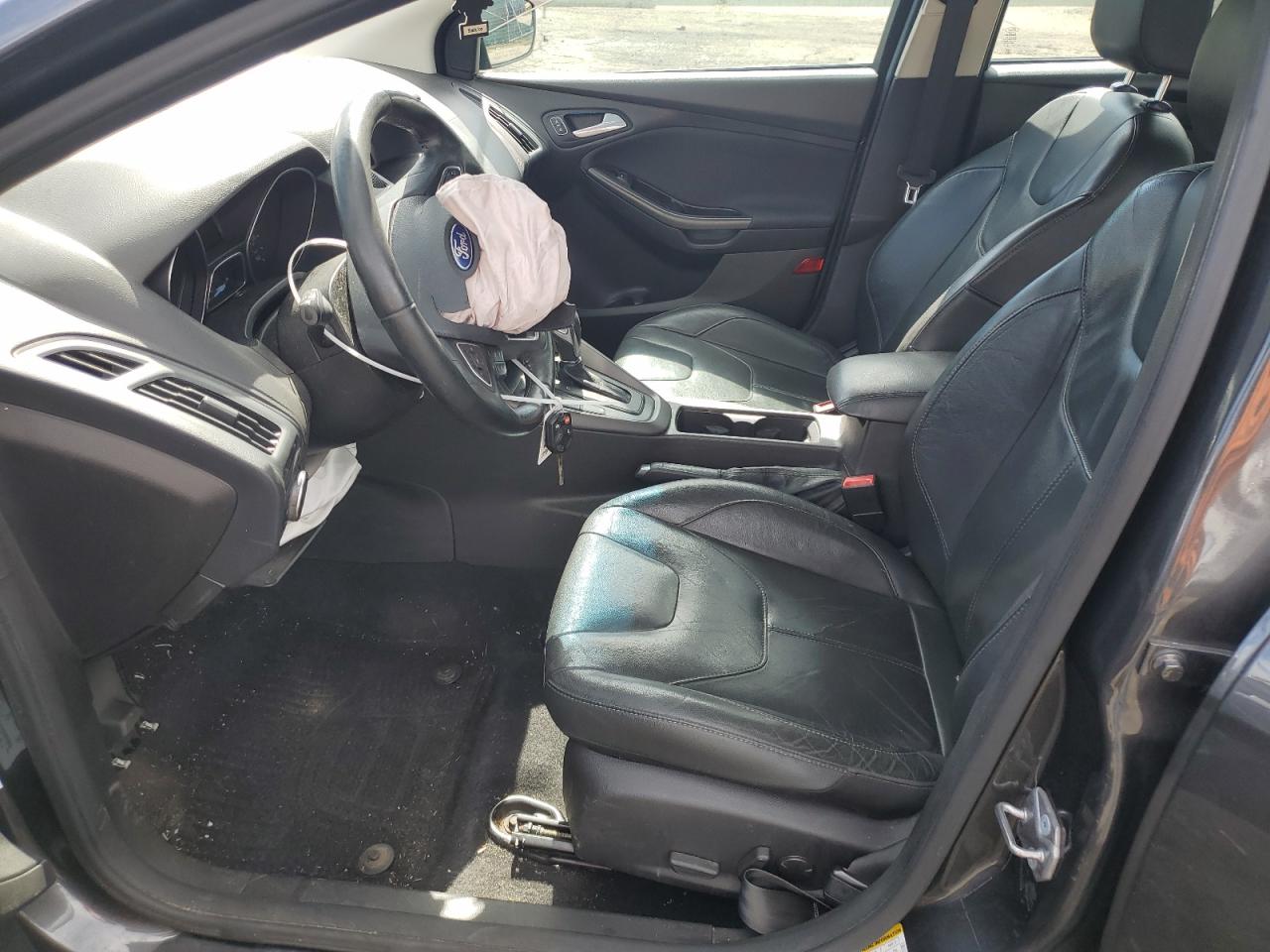 2016 Ford Focus Se VIN: 1FADP3F21GL323558 Lot: 84638085