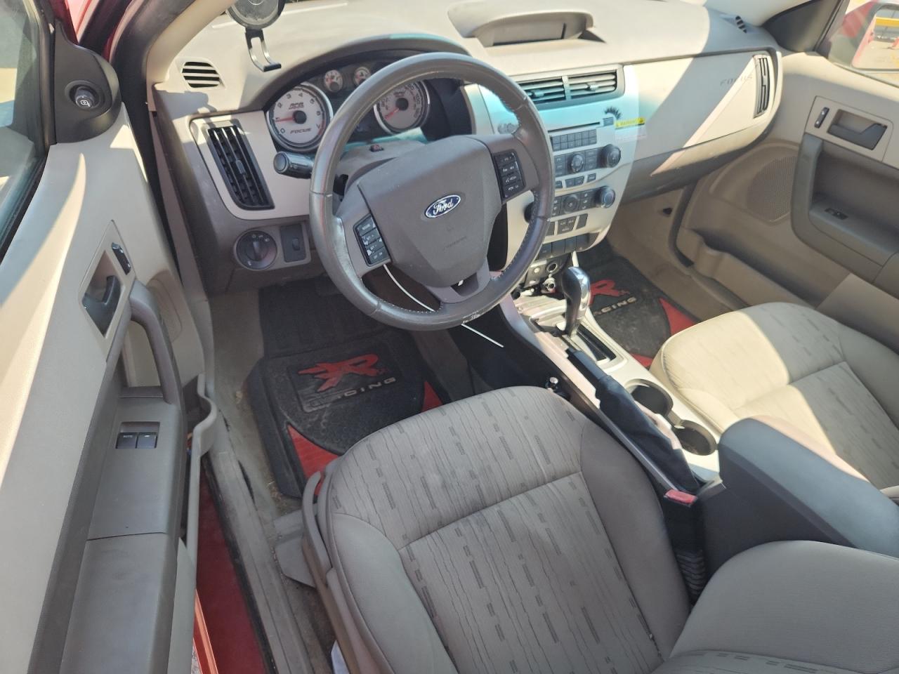 2009 Ford Focus Se VIN: 1FAHP32N79W147215 Lot: 84410725