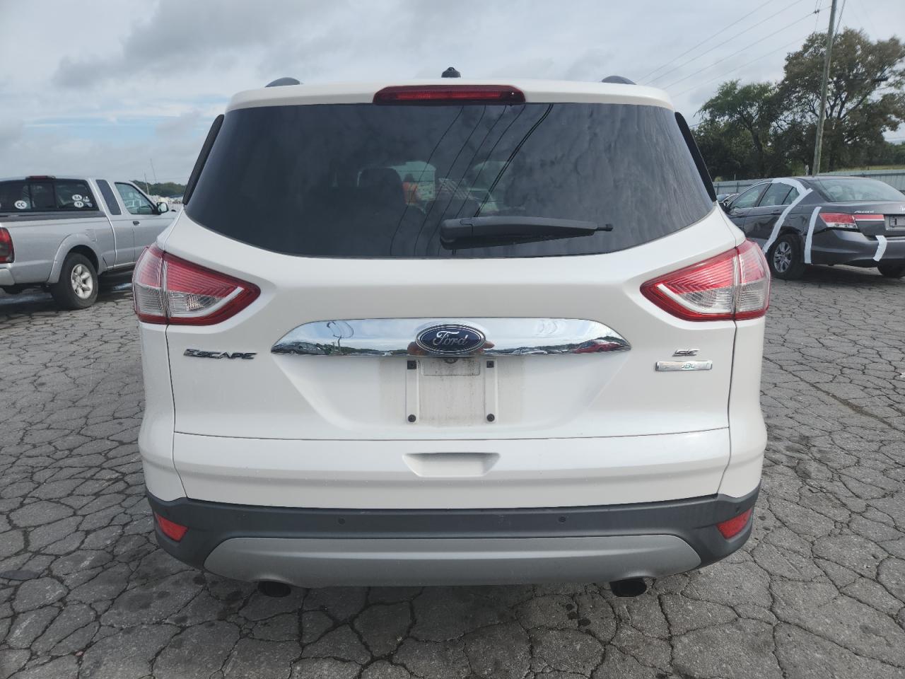 2016 Ford Escape Se VIN: 1FMCU0GX7GUC76985 Lot: 82020675