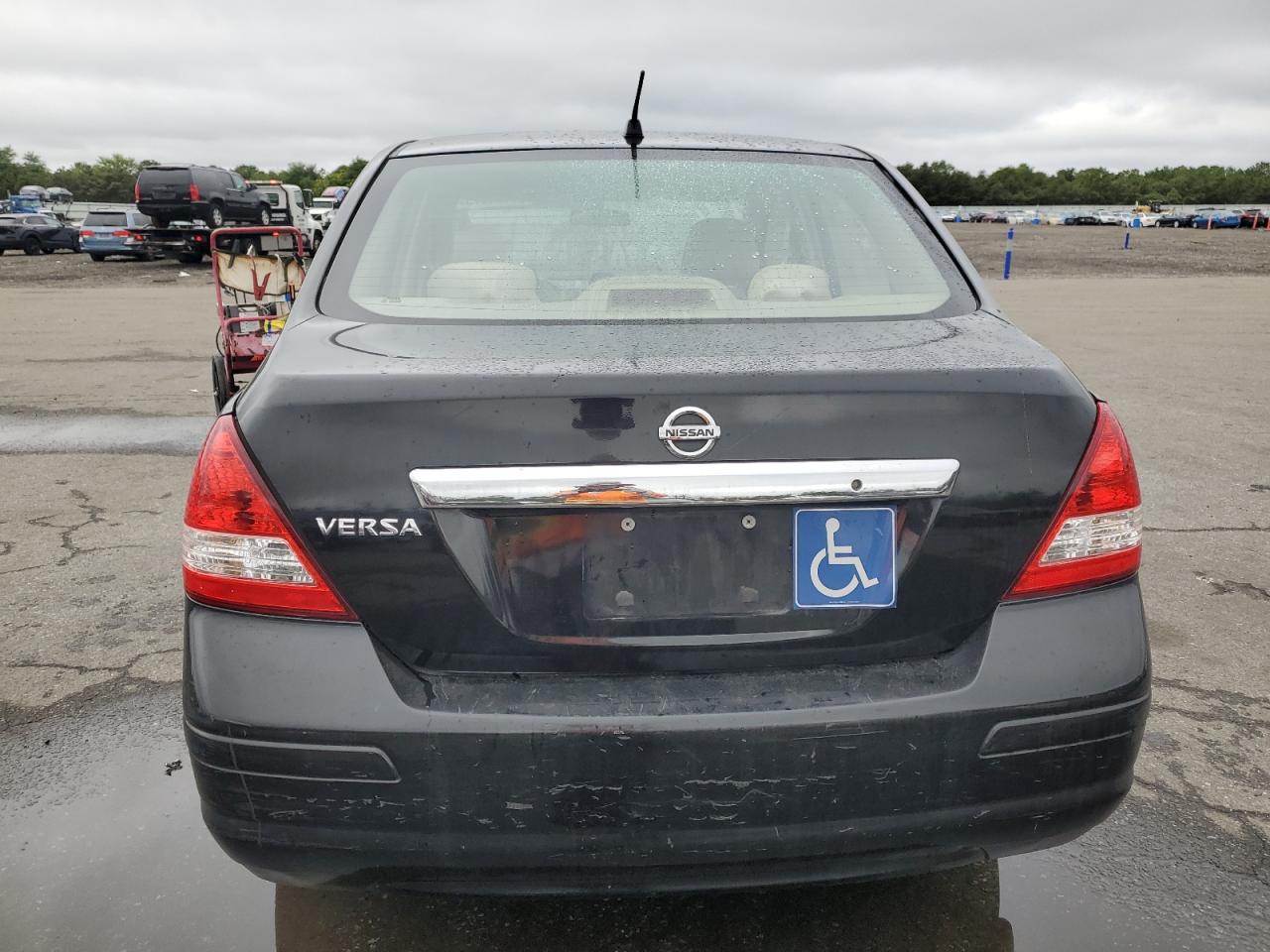 2009 Nissan Versa S VIN: 3N1BC11E99L444660 Lot: 81164075