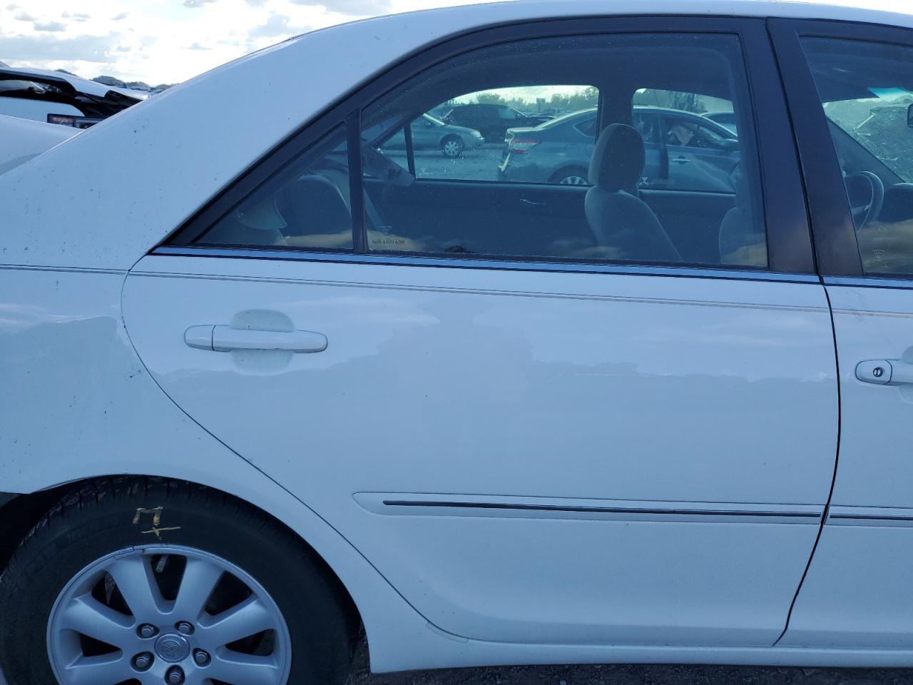 2002 Toyota Camry Le VIN: 4T1BE32K52U112567 Lot: 84189535