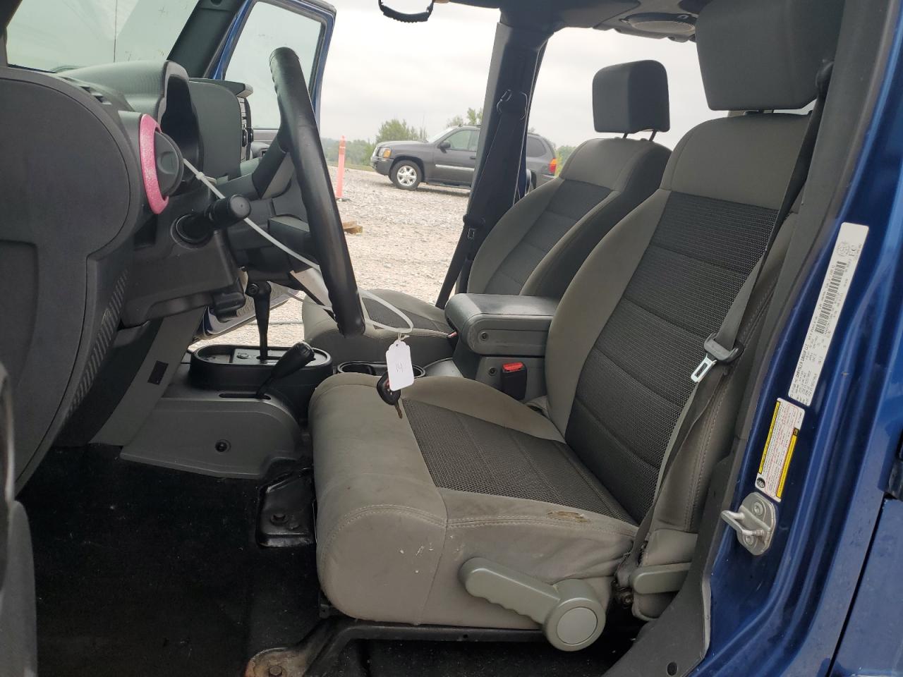 2010 Jeep Wrangler Unlimited Sahara VIN: 1J4BA5H19AL115464 Lot: 81629775