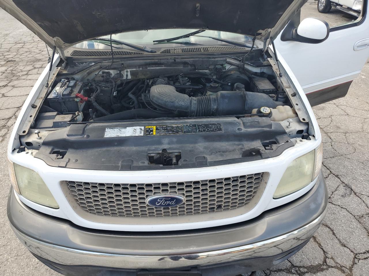 2002 Ford F150 VIN: 1FTRX18L42NB96490 Lot: 83827175