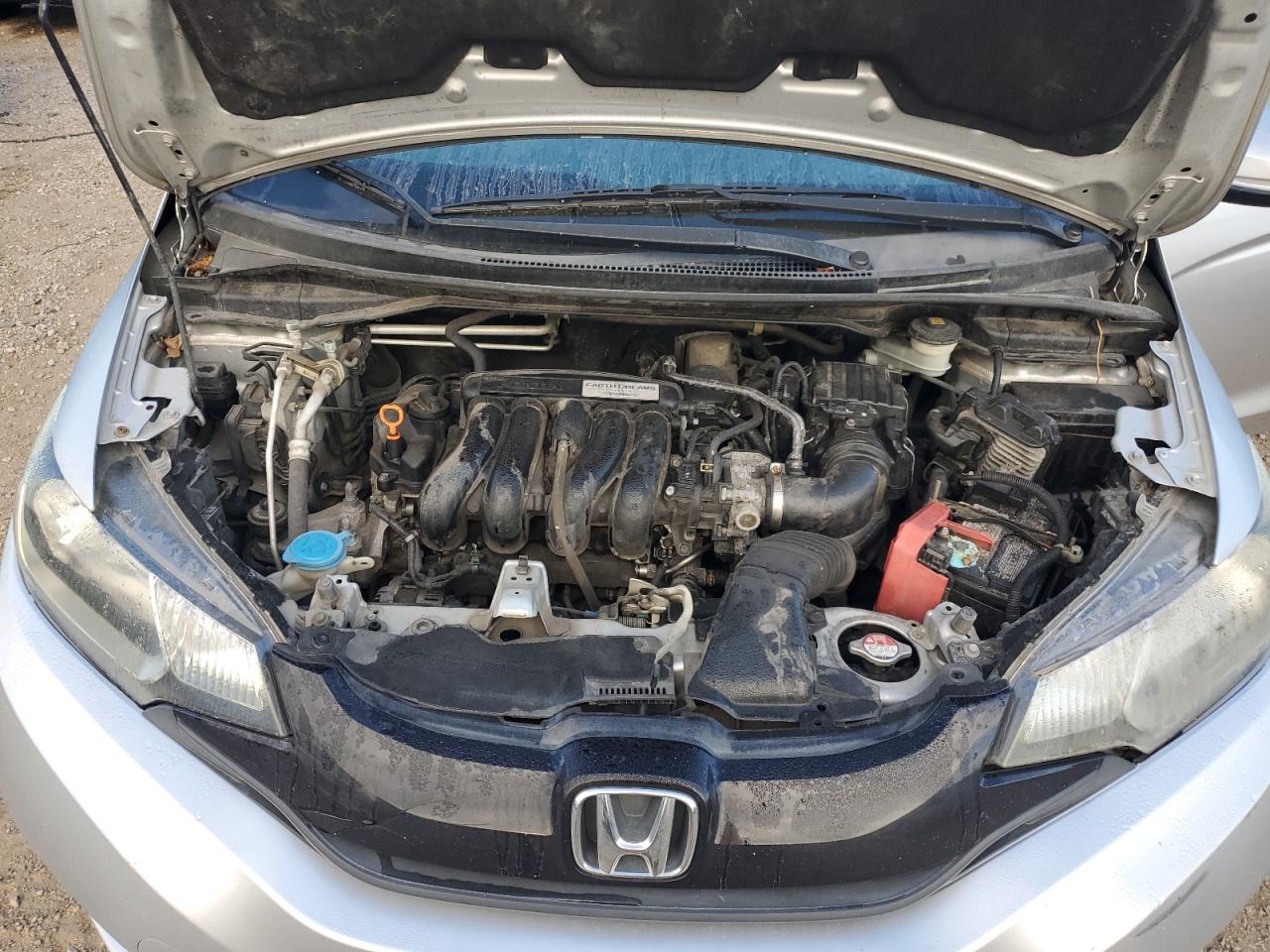 2016 Honda Fit Lx VIN: JHMGK5H54GX021035 Lot: 81524075