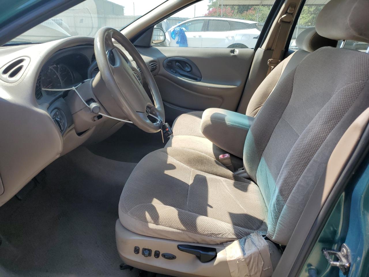 1999 Ford Taurus Se VIN: 1FAFP53U0XG112855 Lot: 80790835