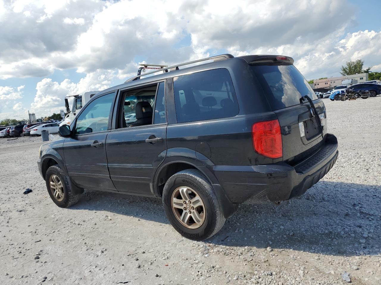 2004 Honda Pilot Exl VIN: 2HKYF18594H558493 Lot: 80938495