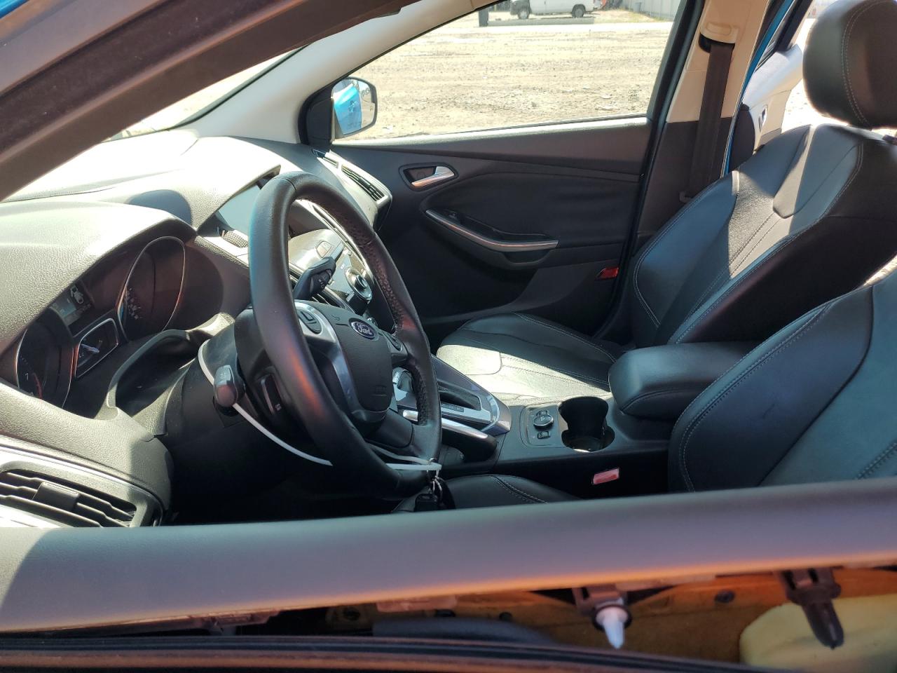 2012 Ford Focus Titanium VIN: 1FAHP3J21CL409908 Lot: 80290285