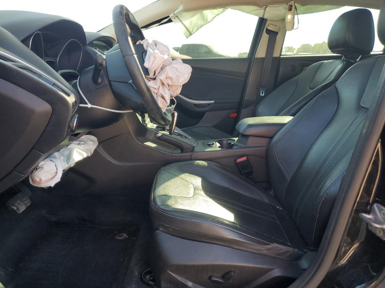 2014 Ford Focus Titanium VIN: 1FADP3J20EL253412 Lot: 83834645