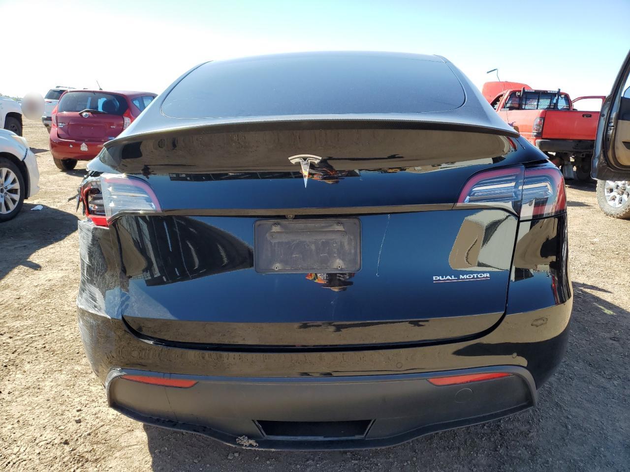 2022 Tesla Model Y VIN: 7SAYGDEF0NF513697 Lot: 84219295