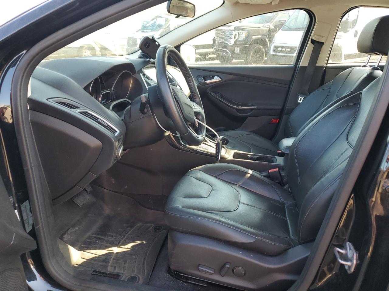 2015 Ford Focus Titanium VIN: 1FADP3J20FL315358 Lot: 81679805