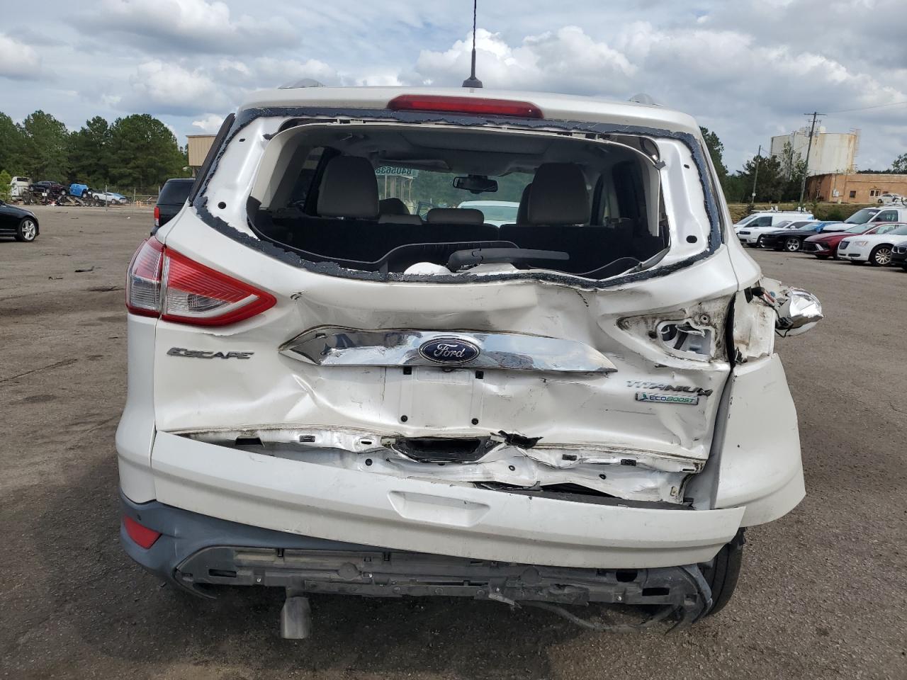 2014 Ford Escape Titanium VIN: 1FMCU0JX0EUE46903 Lot: 84056385