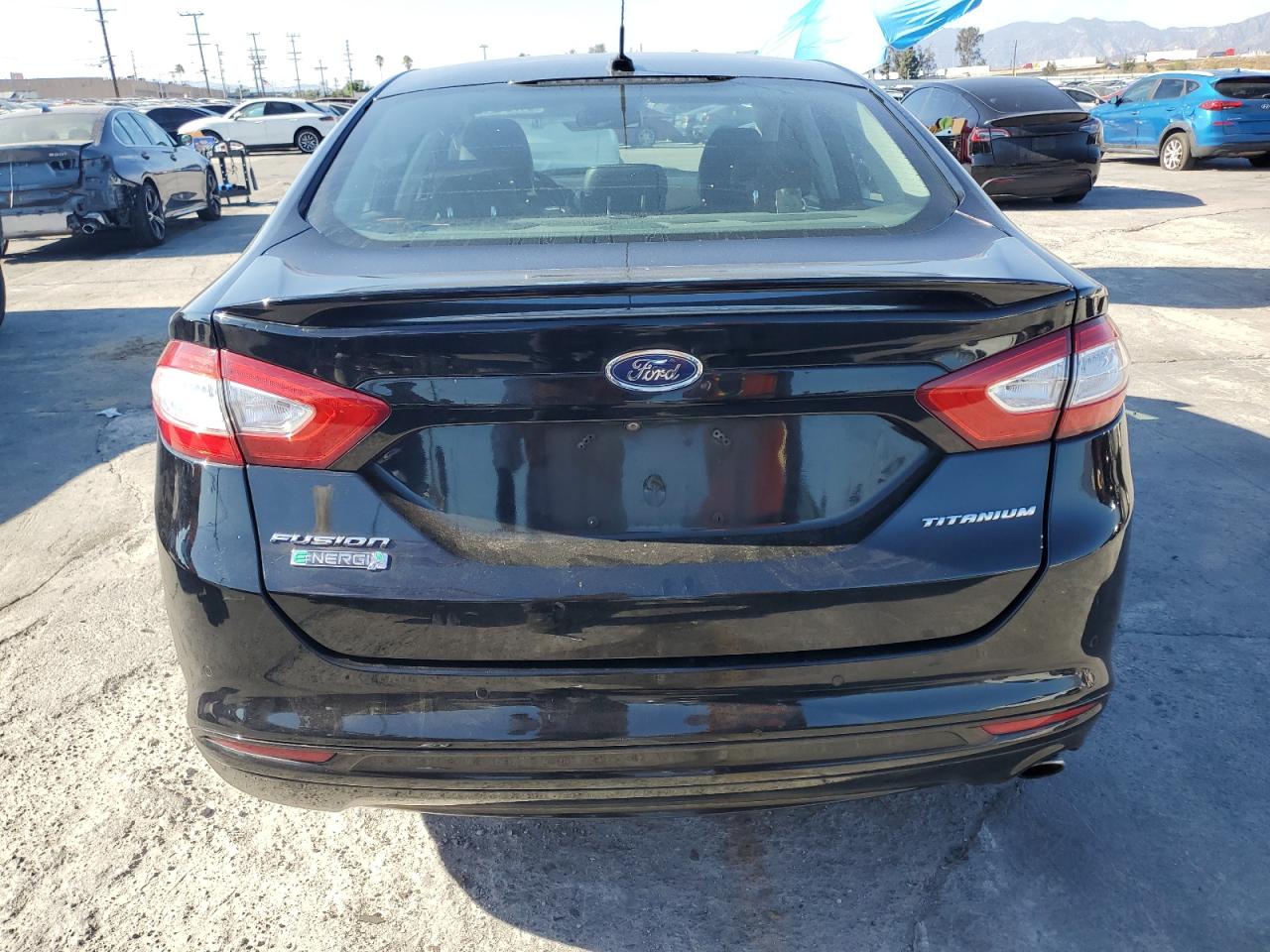 2016 Ford Fusion Titanium Phev VIN: 3FA6P0SU1GR115096 Lot: 84784215