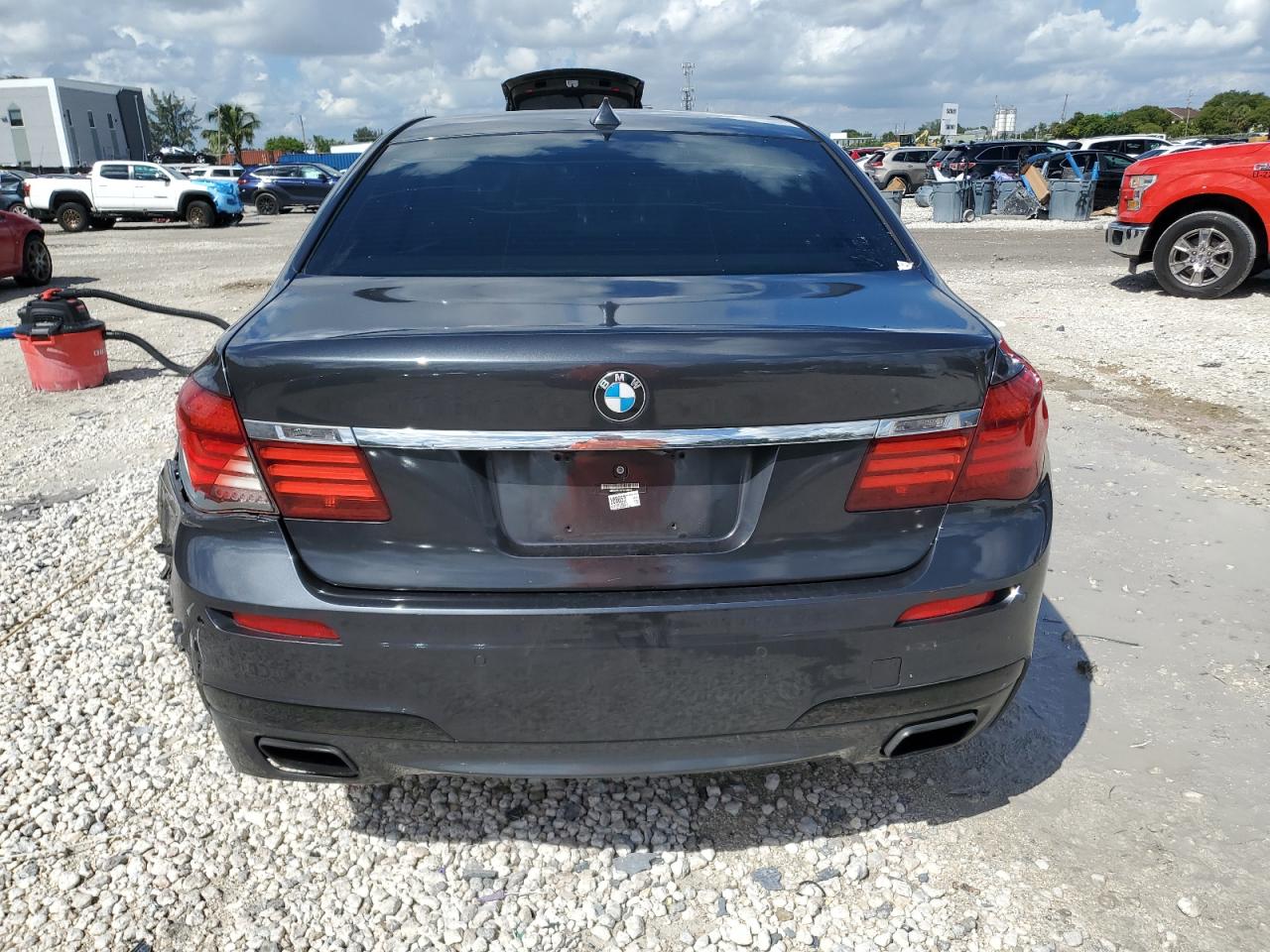 2015 BMW 740 I VIN: WBAYA6C50FGK16244 Lot: 84005165
