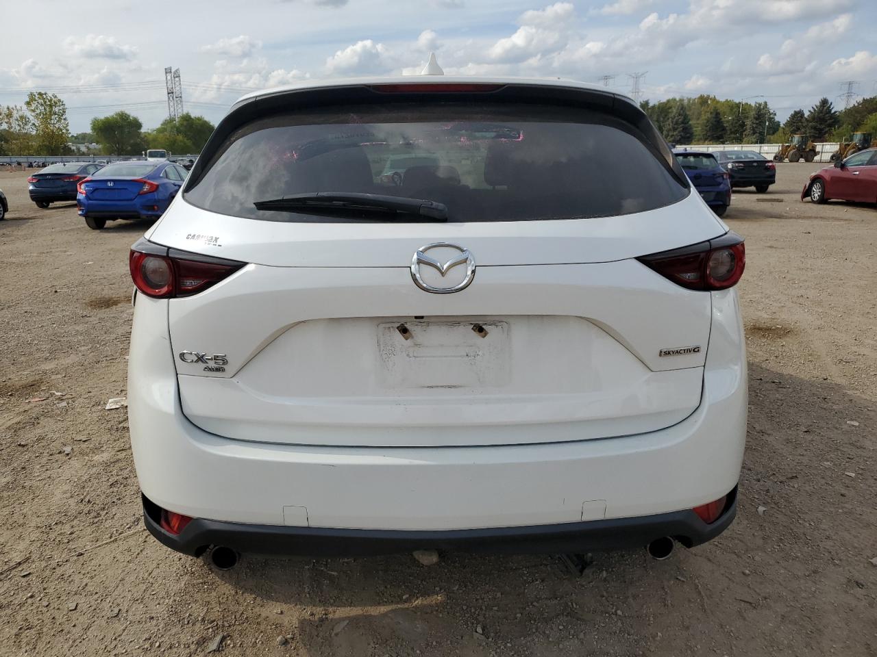 2020 Mazda Cx-5 Touring VIN: JM3KFBCM9L0761705 Lot: 82076275