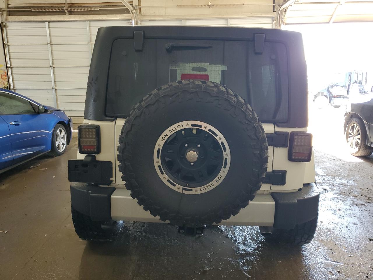 2010 Jeep Wrangler Unlimited Sahara VIN: 1J4BA5H17AL215482 Lot: 84401695