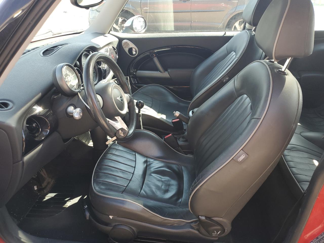 2006 Mini Cooper S VIN: WMWRE33506TL19789 Lot: 84004025