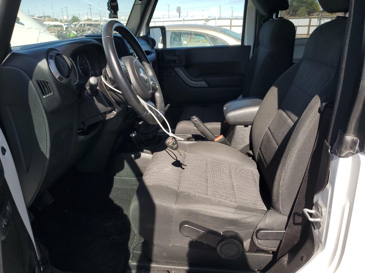 2012 Jeep Wrangler Sport VIN: 1C4AJWAGXCL208390 Lot: 80902665