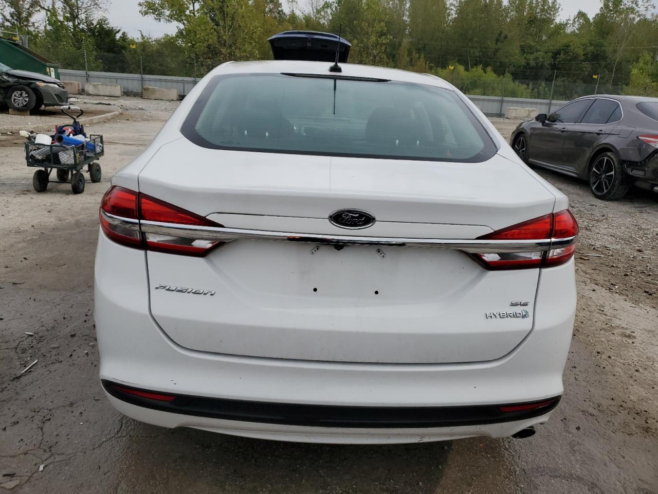 2017 Ford Fusion Se Hybrid VIN: 3FA6P0LUXHR381619 Lot: 83940175