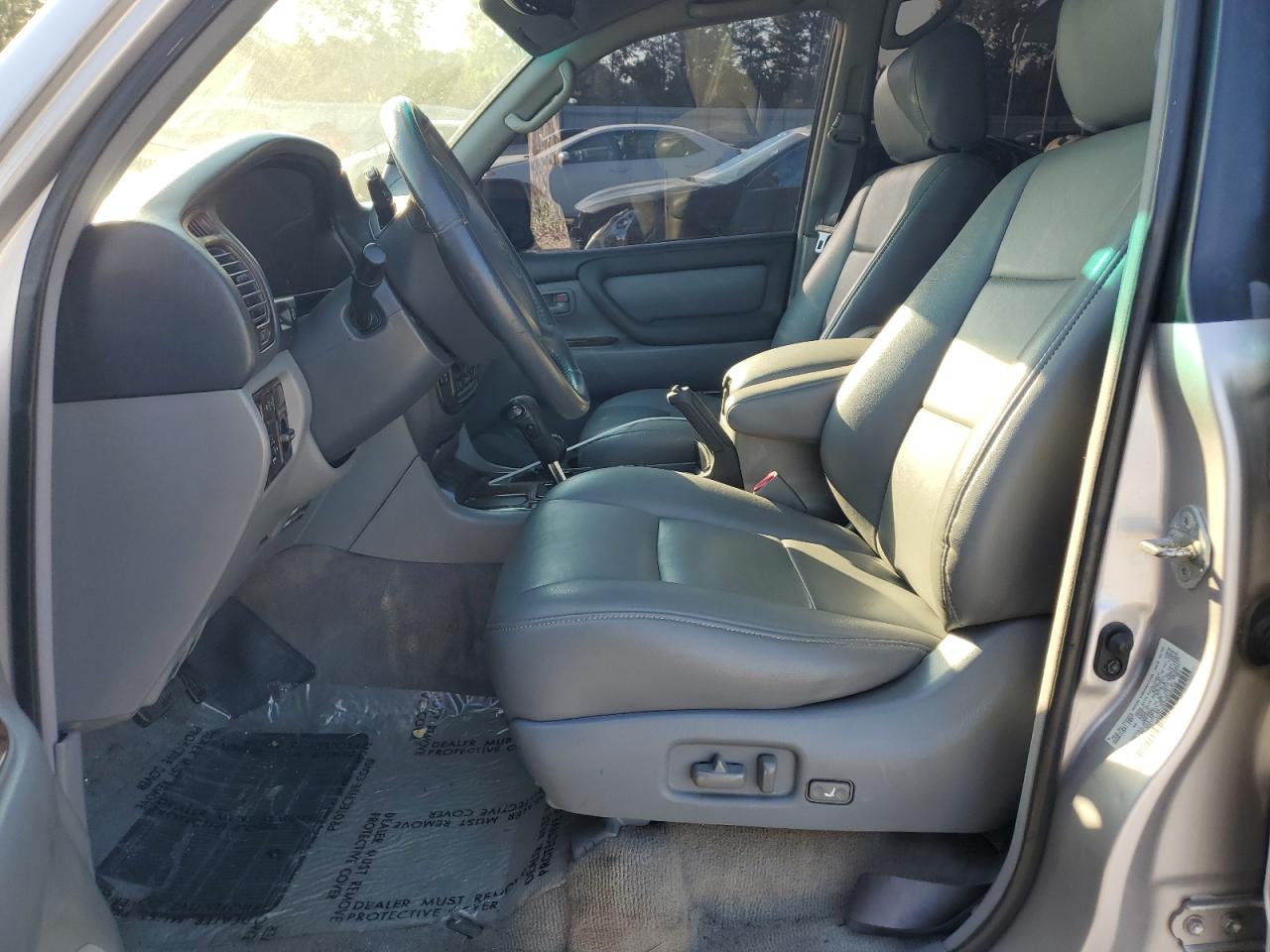 1999 Toyota Land Cruiser VIN: JT3HT05J5X0055392 Lot: 80380435