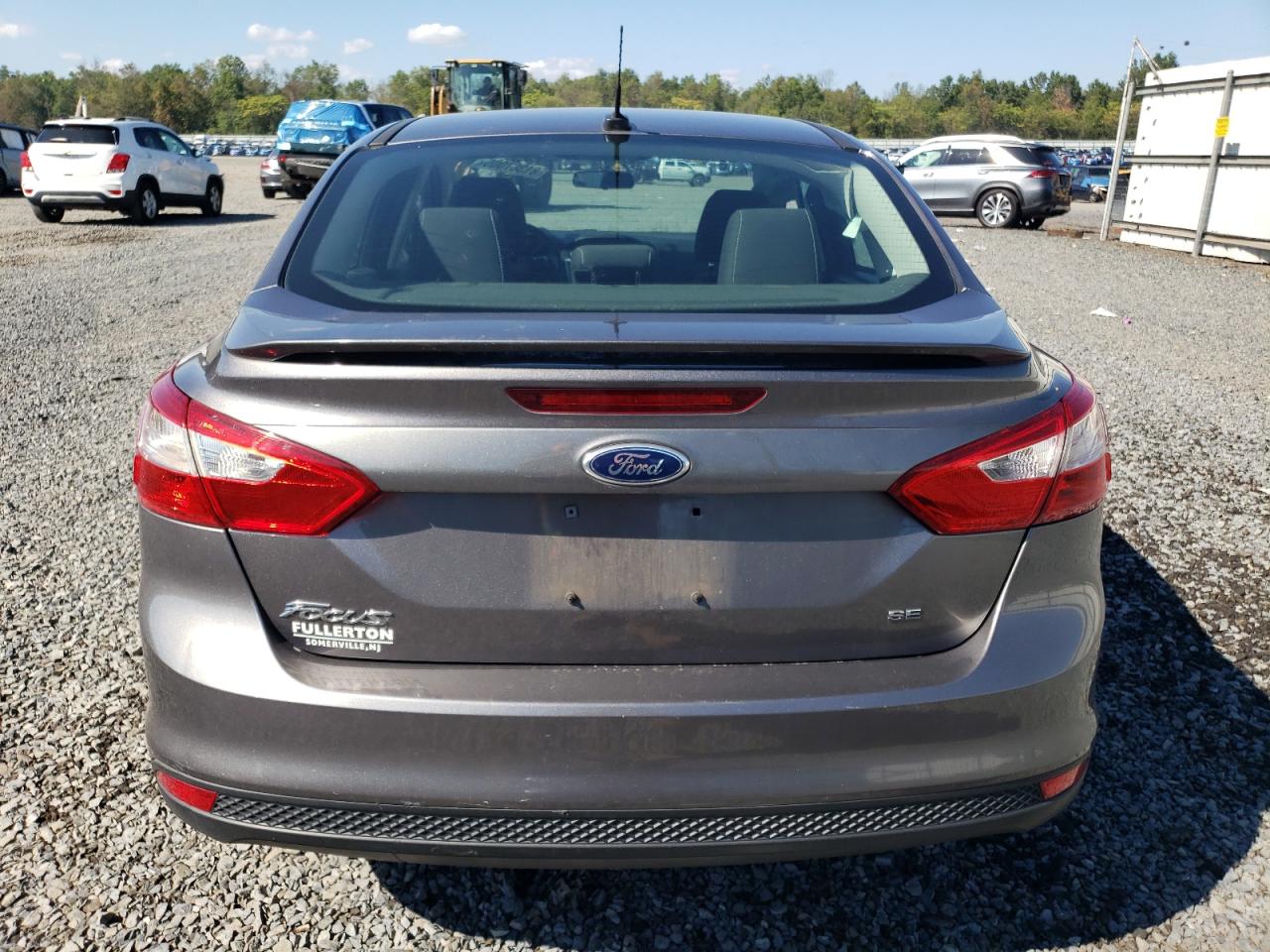2014 Ford Focus Se VIN: 1FADP3F23EL285246 Lot: 81387005