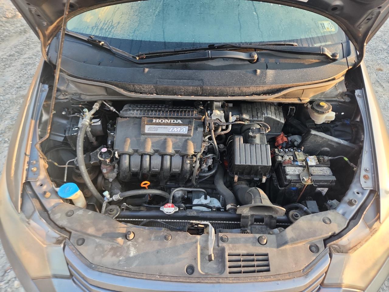 2010 Honda Insight Ex VIN: JHMZE2H73AS024769 Lot: 80898895